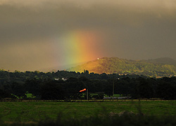 A photo of a Summer storm over White Nancy taken by David Buszard
