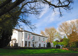 A photograph of the Deanwater Hotel in Woodford, Cheshire
