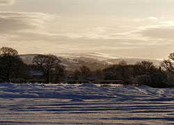 A photo of distant hills from Woodford, Cheshire taken by Evelyn Frearson