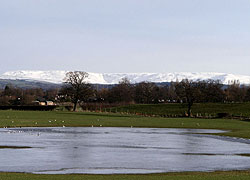 A photo of Kinder Scout taken from Church Lane in Woodford, Cheshire taken by Evelyn Frearson